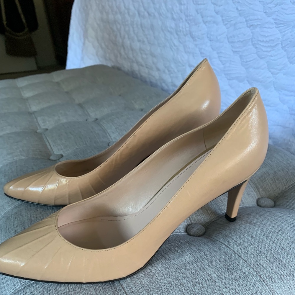 Stuart Weitzman light tan pump.